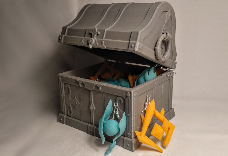 Photo of a 3D printed treasure box and jewelry designed by Angel